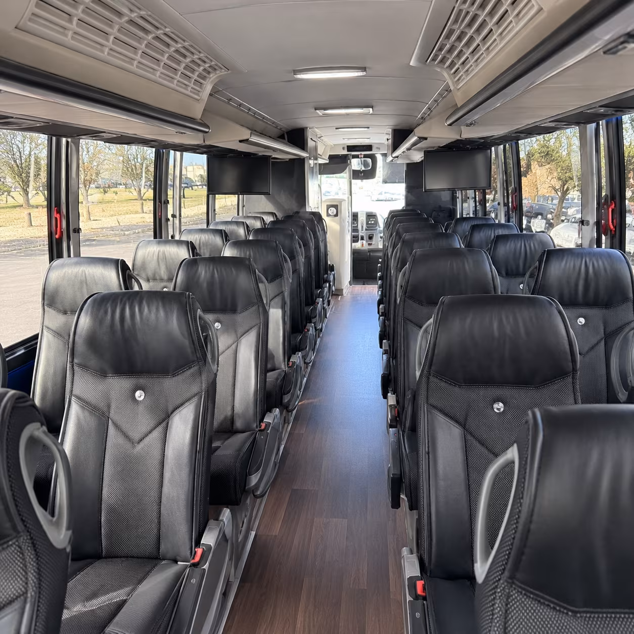 group boarding a minibus in merced